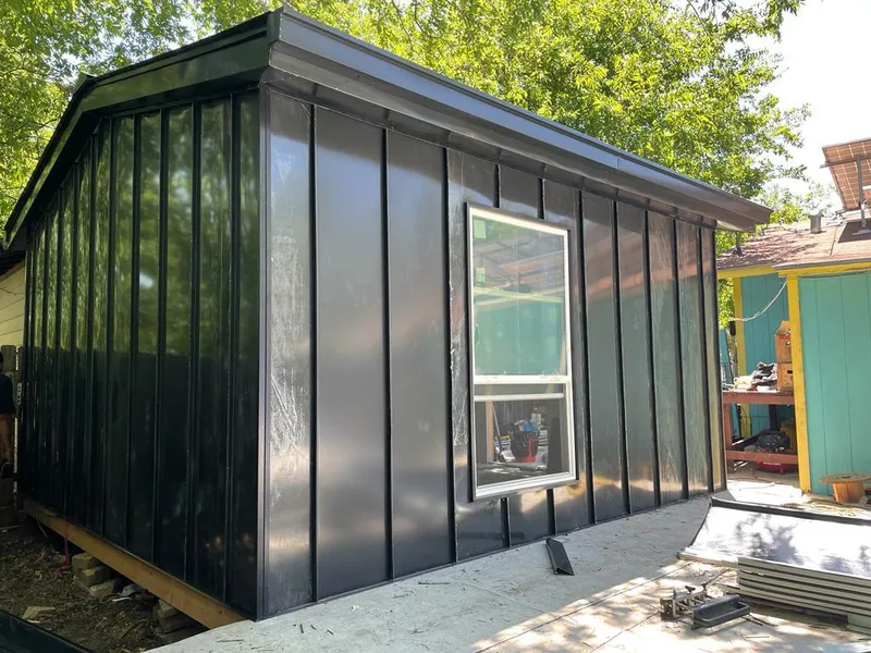 Black standing seam metal wall panels for Roof Inspection in Ossining